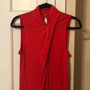 Sleeveless red and black blouse